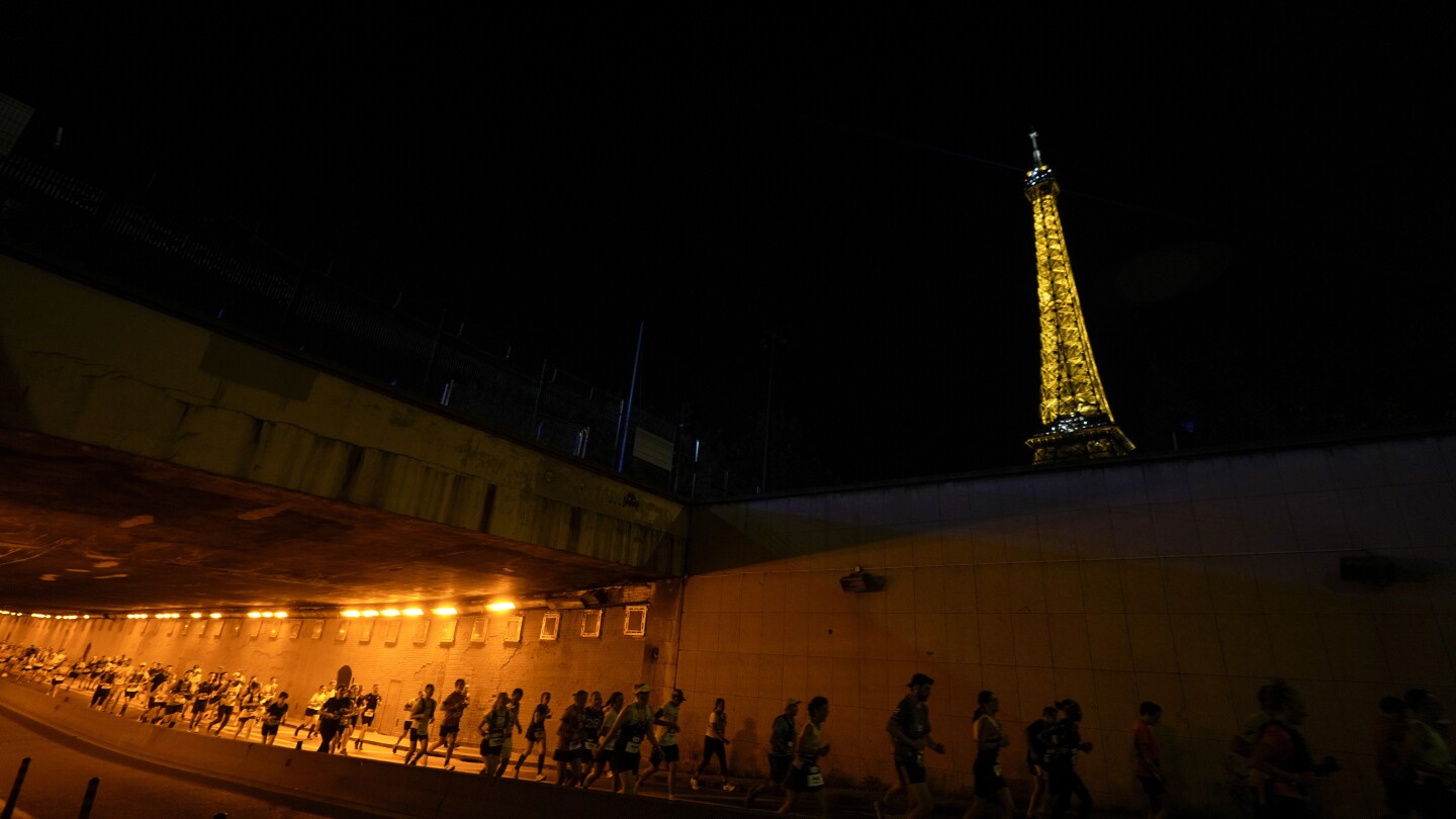 Amateur runners race like Olympians along the same iconic route as competitors in Paris