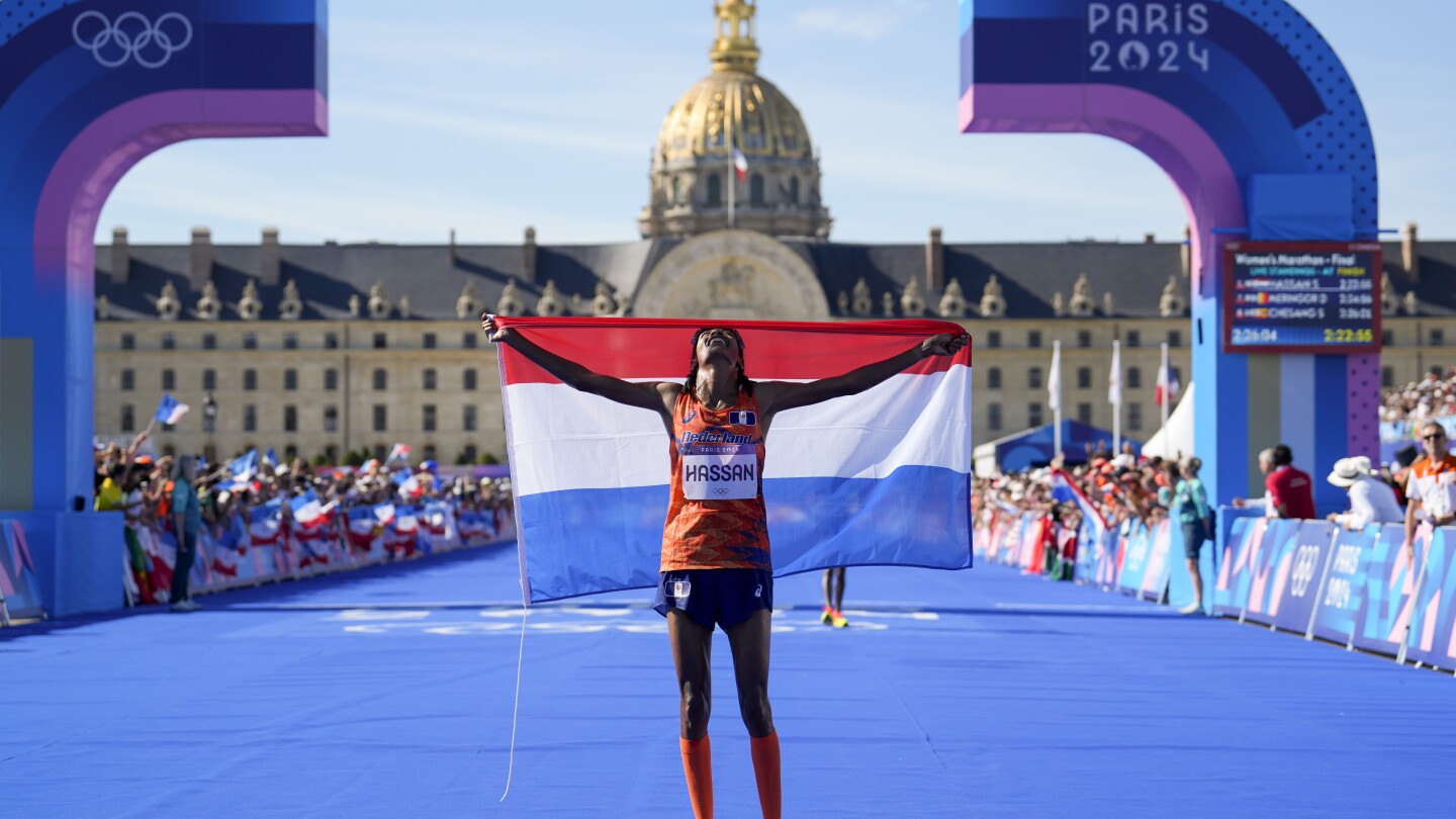 Sifan Hassan wins women’s marathon at Paris Olympics after trading elbows with Tigst Assefa