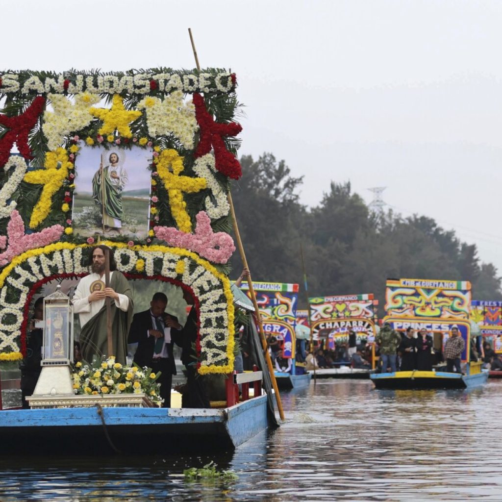 Catholic devotees honor St Jude’s relic with watery procession through Mexico’s Xochimilco canals