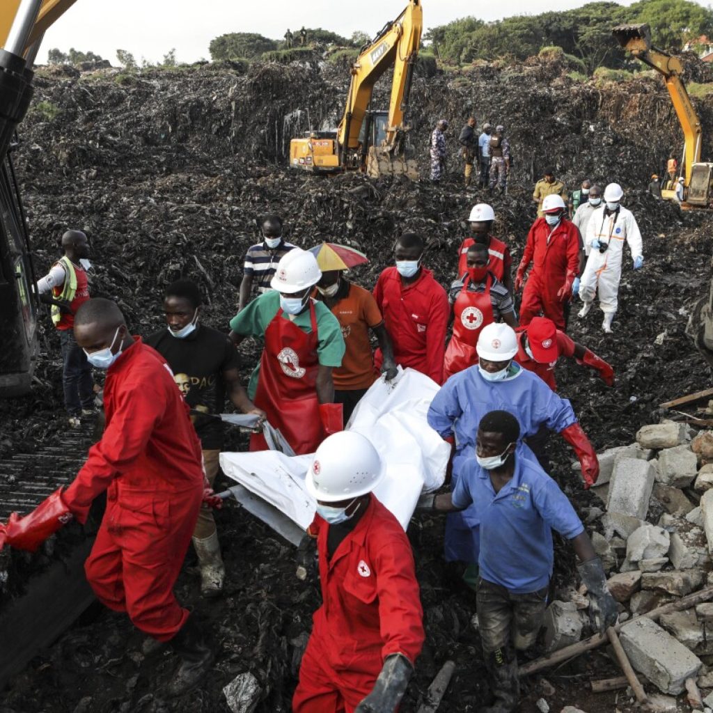 Death toll in Uganda rubbish heap collapse reaches 24 as rescue teams find more victims