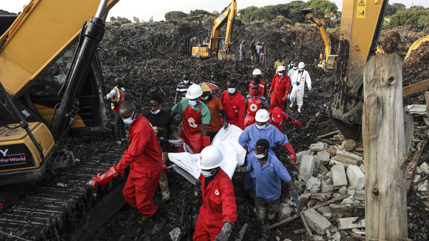 Death toll in Uganda rubbish heap collapse reaches 24 as rescue teams find more victims