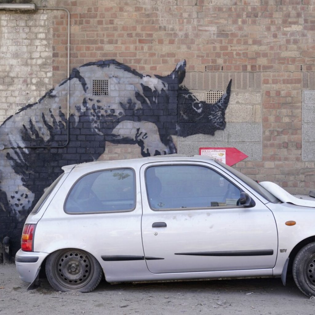 Banksy unveils new rhino art in an animal-themed collection that has popped up across London