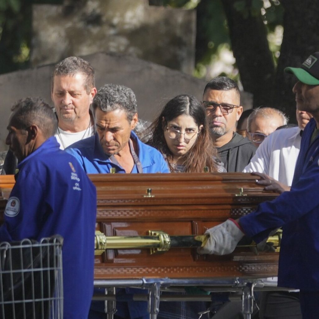 Burials begin for victims of Brazil plane crash that killed 62, as questions remain about its cause