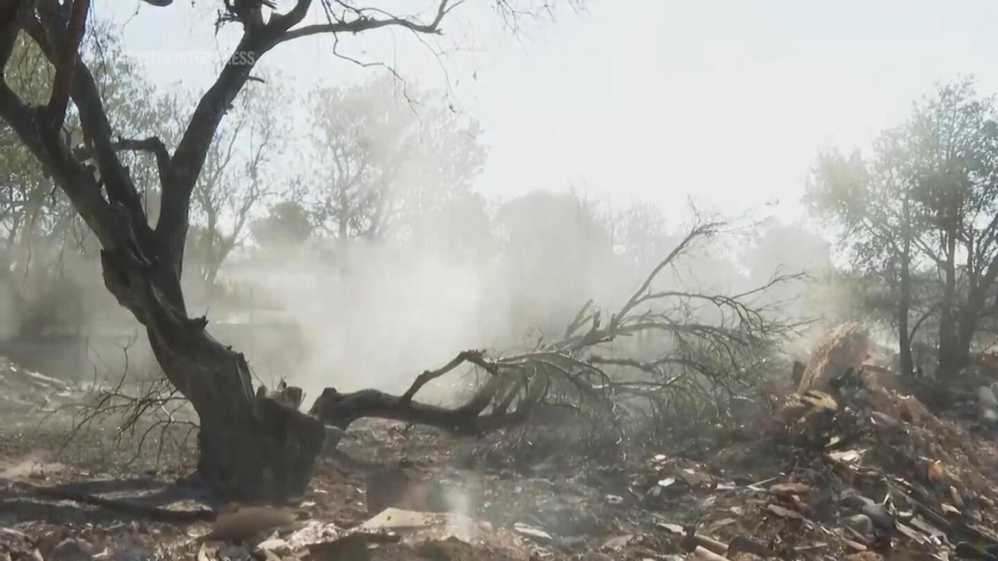 Aftermath of major wildfire on fringes of Athens as reduced winds offer respite | AP News