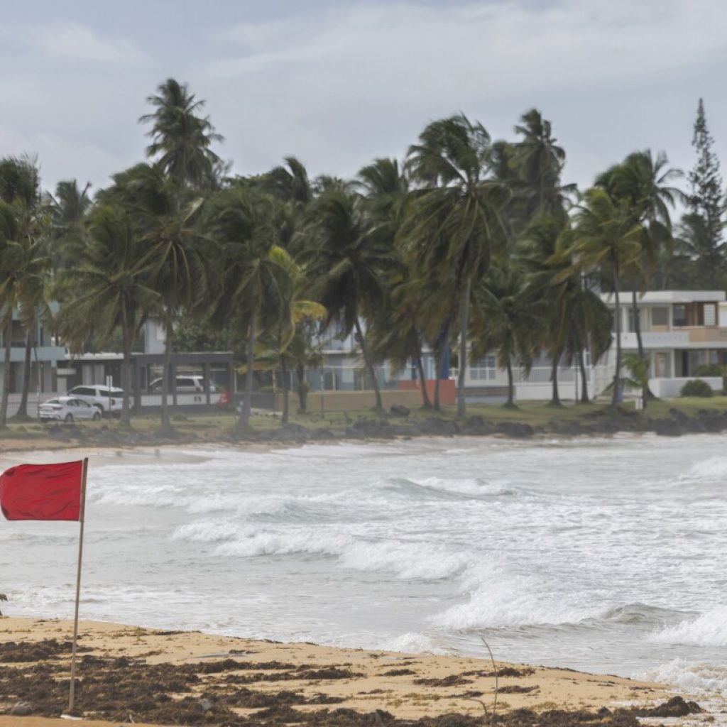 Tropical Storm Ernesto pummels northeast Caribbean and leaves hundreds of thousands in the dark