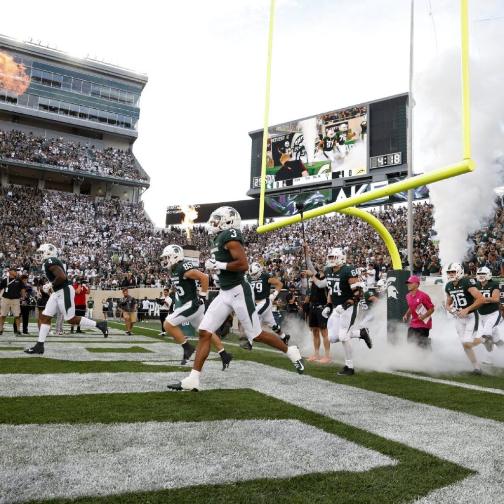 Michigan State sued by quiz creator over Hitler question streamed on videoboards at football game