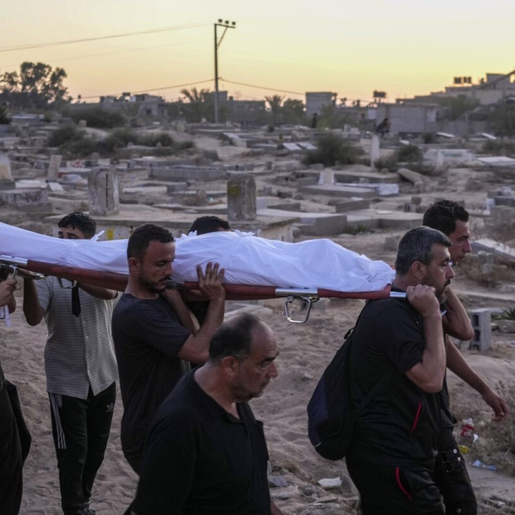 As Gaza death toll passes 40,000, corpses are buried in yards, streets, tiered graves