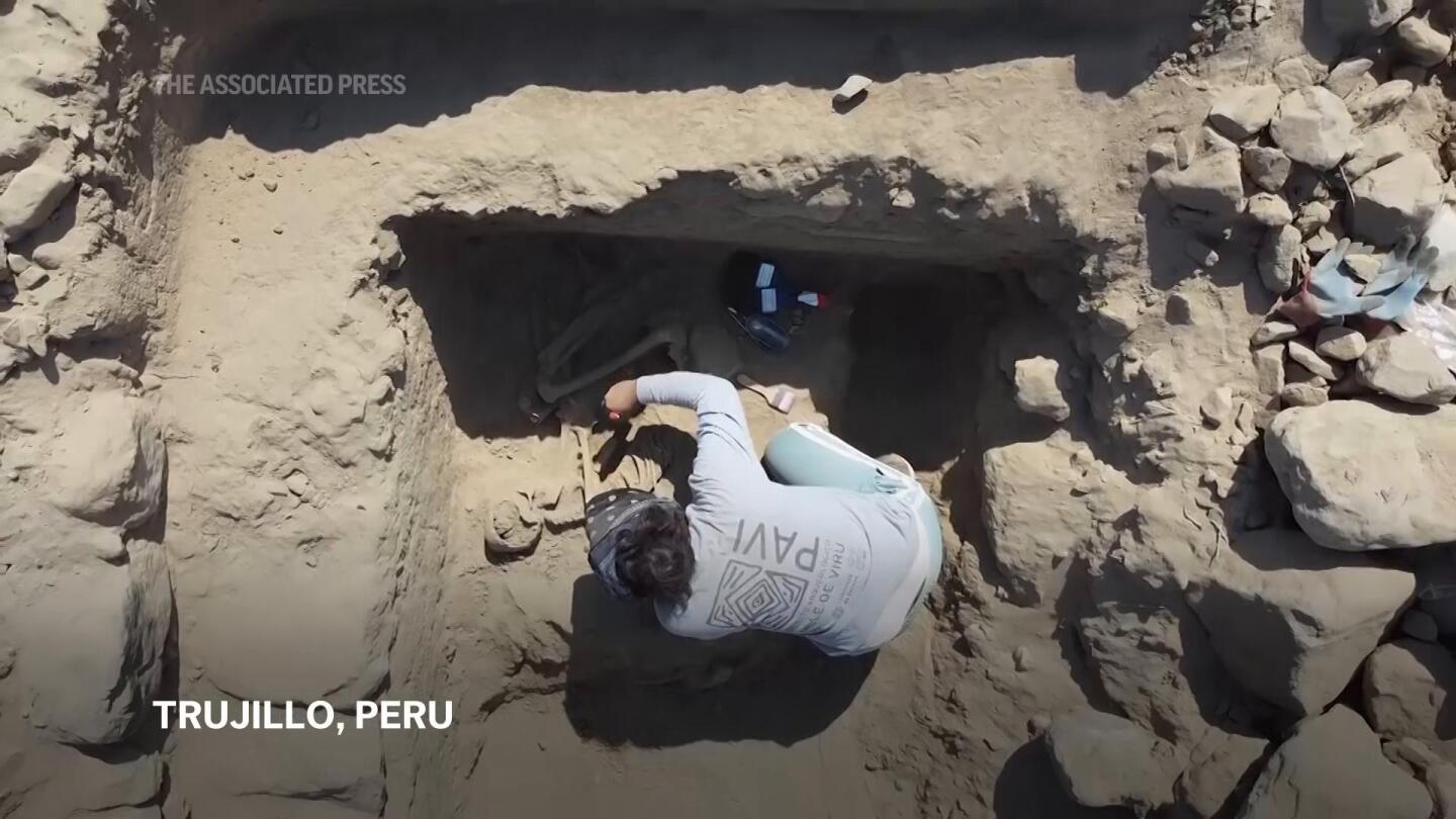 Peruvian archaeologists uncover ancient burial estimated to be 3,800 years old | AP News