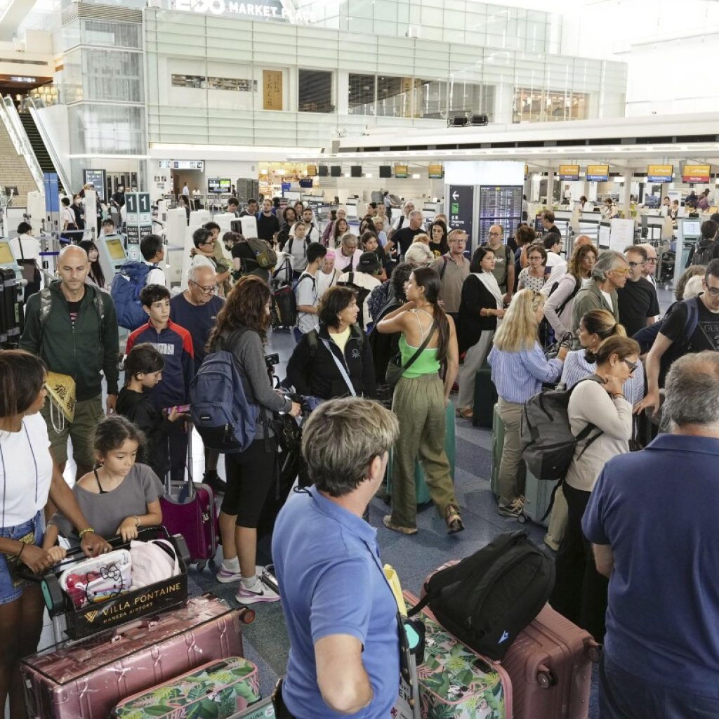 Flights and trains canceled in Tokyo area as a strong typhoon swerves nearby