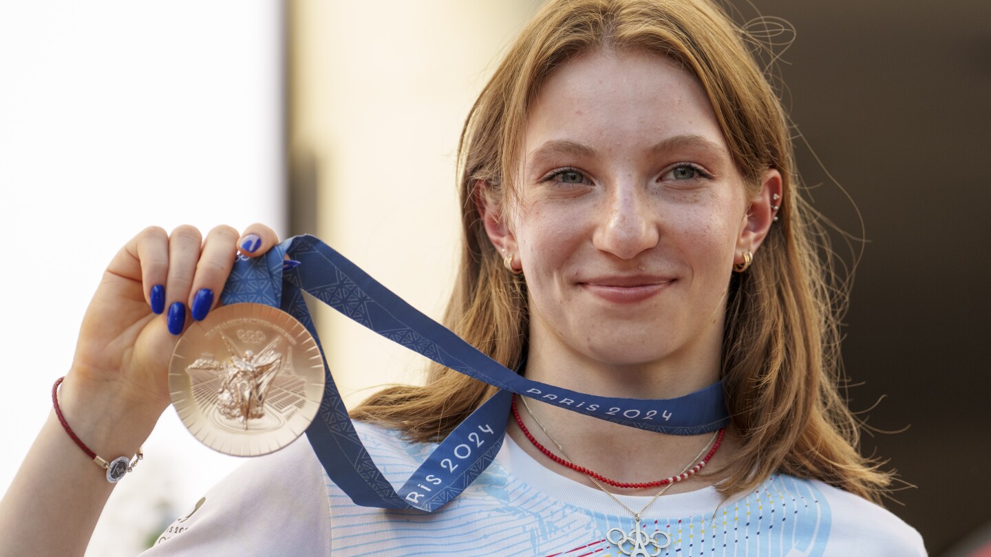 Romanian gymnast Ana Barbosu presented Olympic bronze medal first awarded to American Jordan Chiles