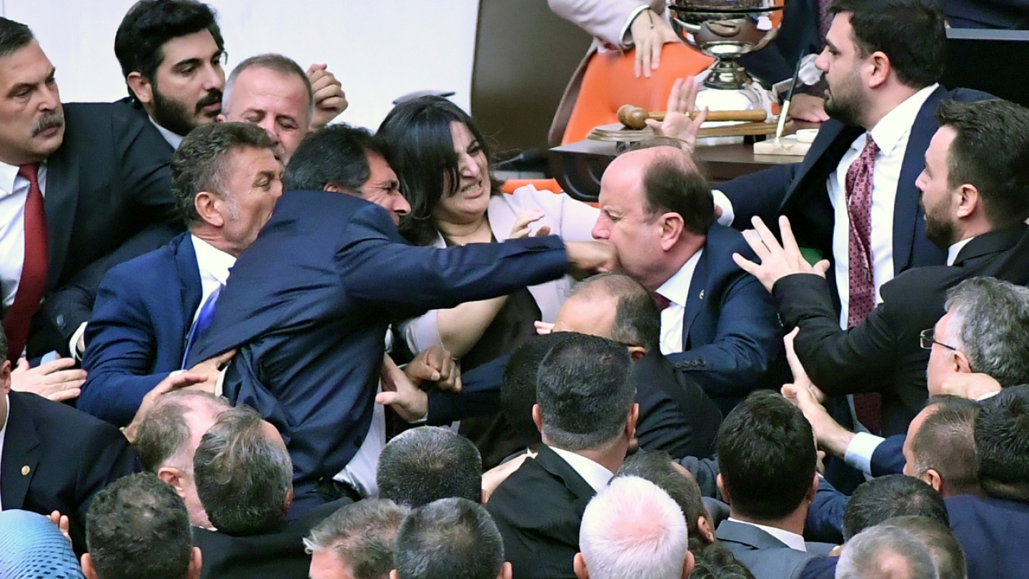 Lawmakers in Turkey draw blood in brawl during parliament debate on jailed colleague | AP News