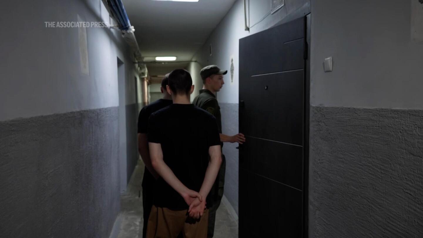 Ukraine offers rare look inside detention center housing Russian troops captured in battle | AP News