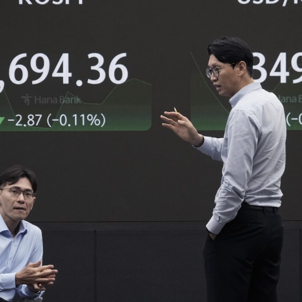 Asian stocks are mixed after Wall Street’s best week of the year