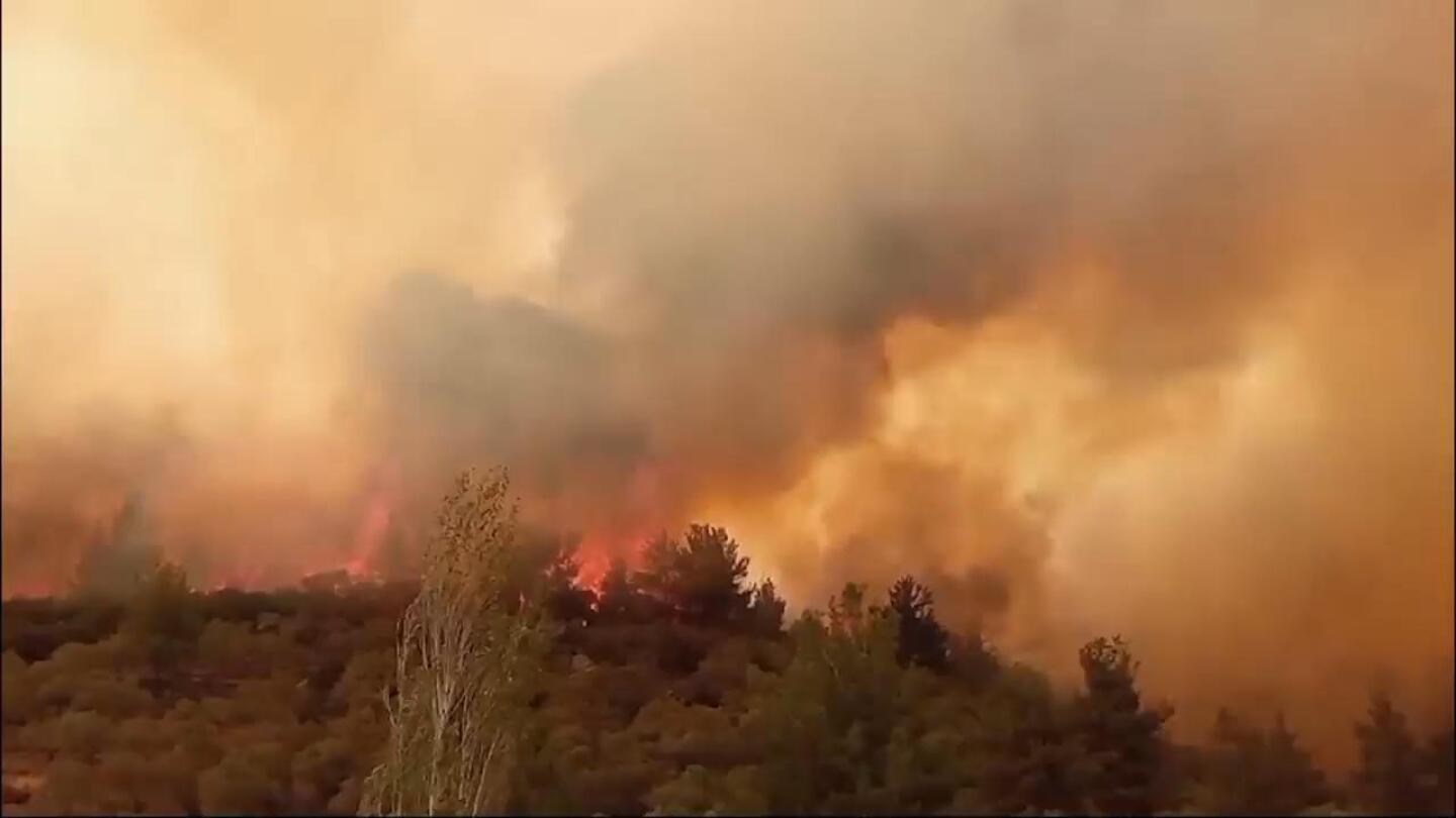 Wildfires break out in popular Turkish tourism destination | AP News