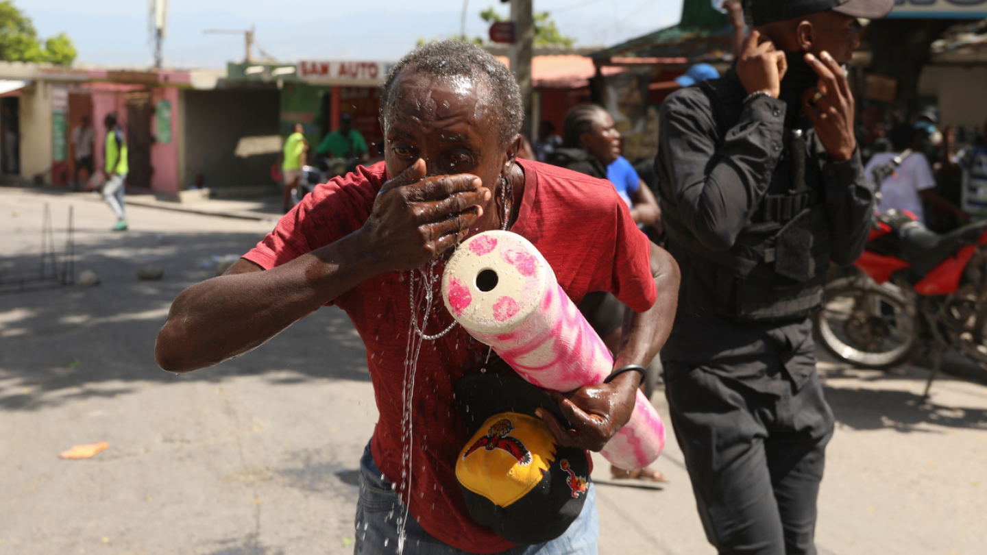 Tear gas deployed at protesters in Haiti capital as gang violence continues | AP News