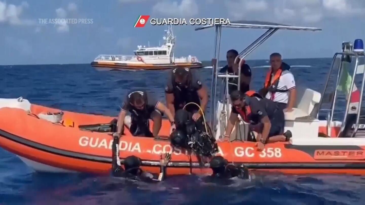 Rescuers search for 6 people believed trapped in yacht that sank off Sicily | AP News