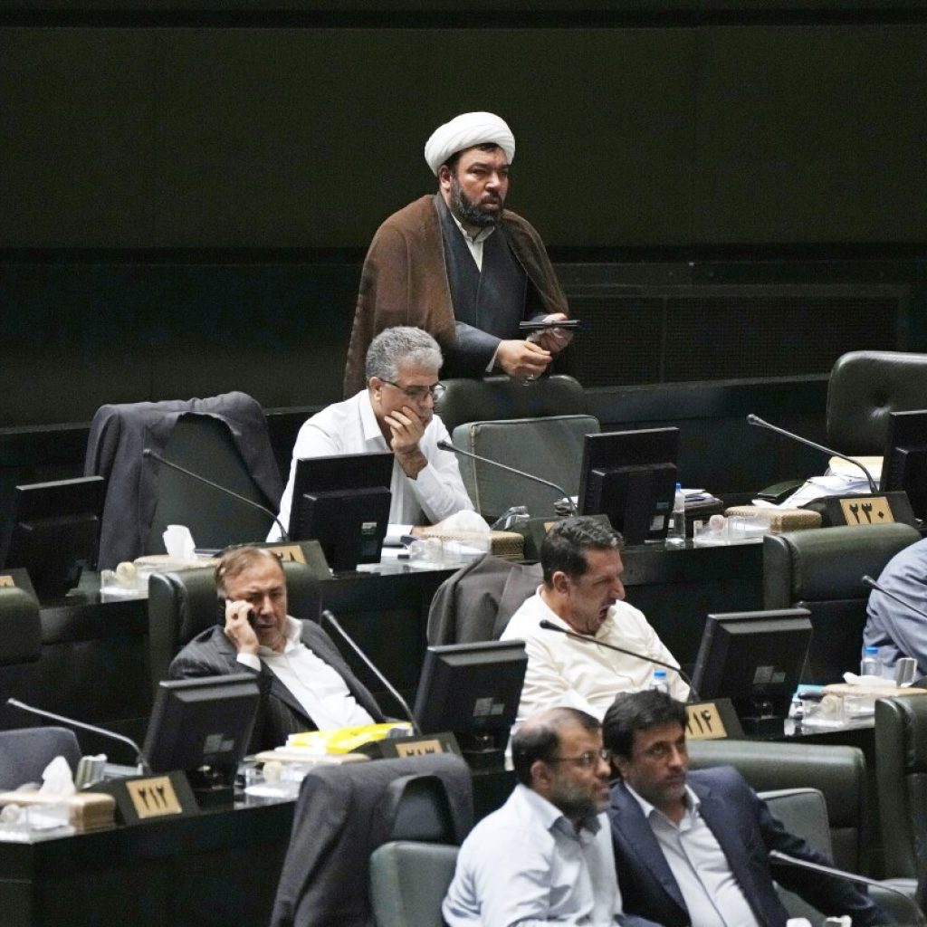 Iran’s hard-line parliament approves all members of president’s Cabinet, first time since 2001