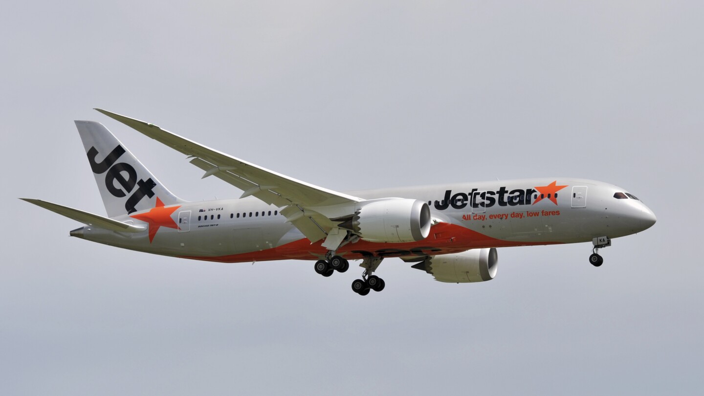 Man opens plane’s door and walks on wing at Australian airport before he’s arrested