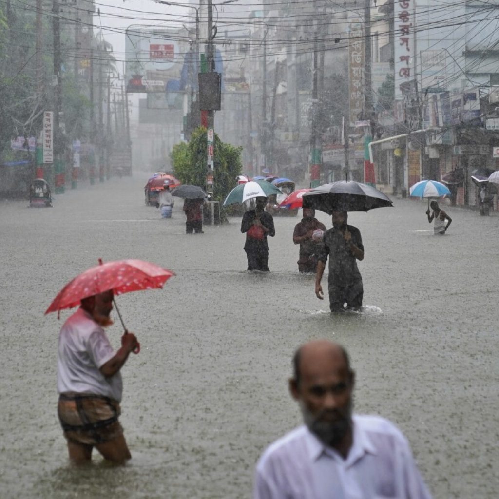 Floods maroon many people in Bangladesh and India and cause at least 15 deaths