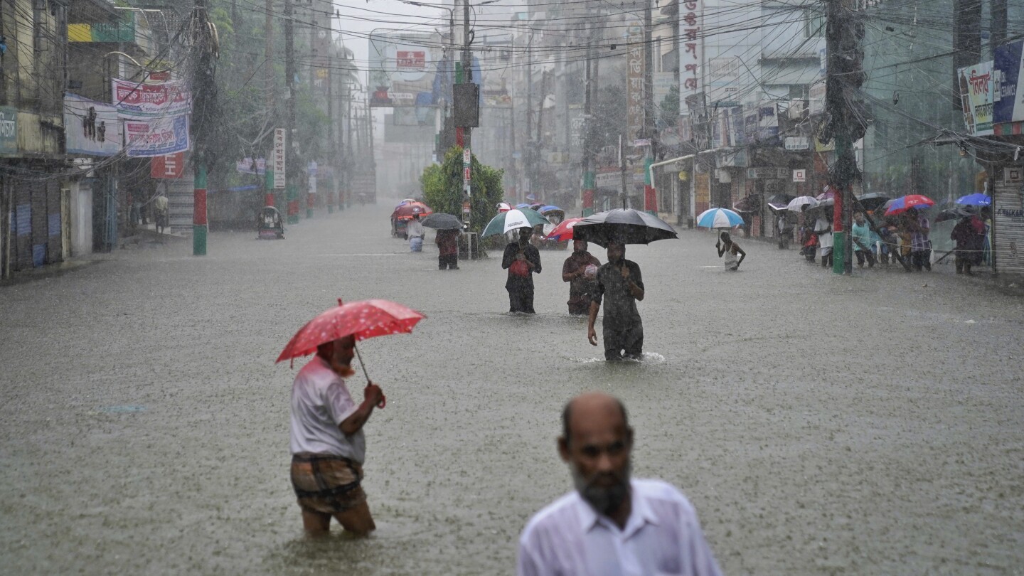 Floods maroon many people in Bangladesh and India and cause at least 15 deaths