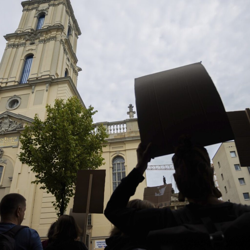 German president inaugurates the rebuilt tower of a church with Nazi-era historical baggage