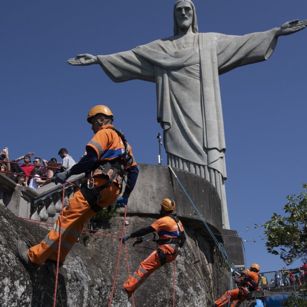 Rio de Janeiro climbers clean site of Christ the Redeemer statue