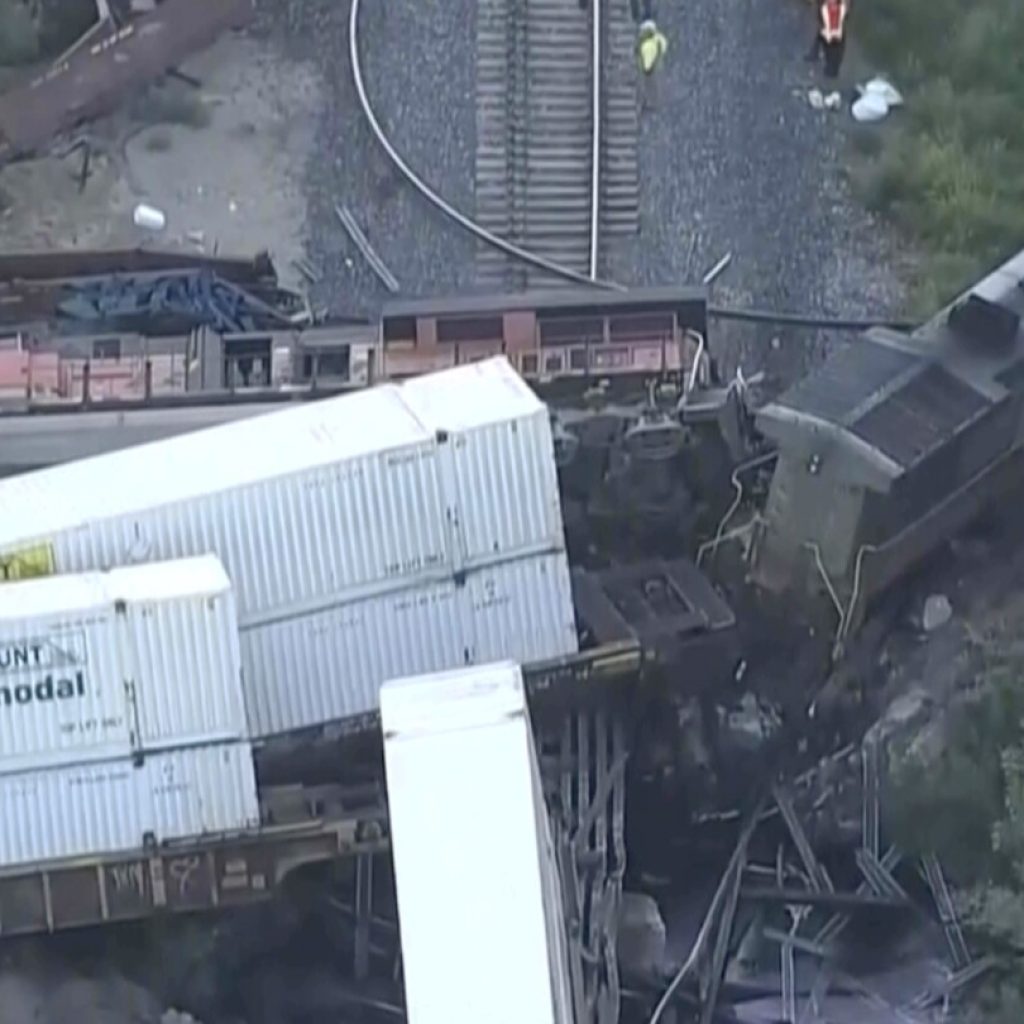 2 freight trains collided in Colorado, damaging a bridge, spilling fuel and injuring 2 conductors