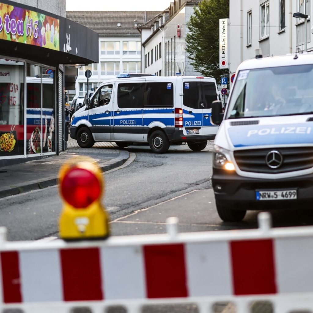 Police search for the man who killed 3 in a knife attack in the German city of Solingen