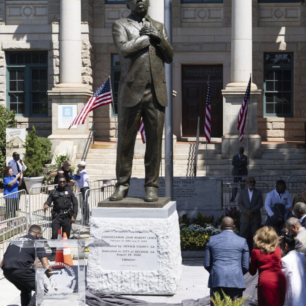 Crowd on hand for unveiling of John Lewis statue at spot where Confederate monument once stood