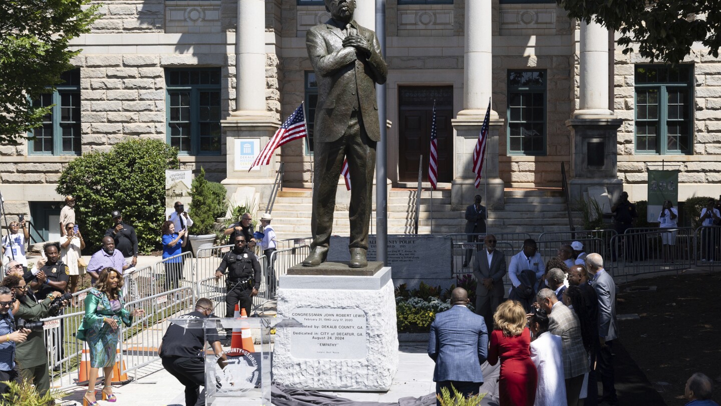 Crowd on hand for unveiling of John Lewis statue at spot where Confederate monument once stood