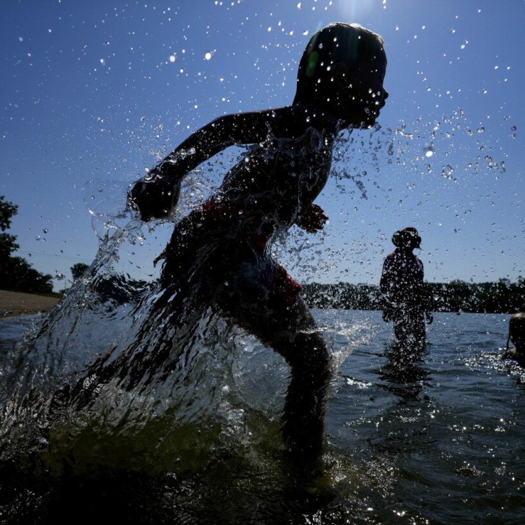 Wild week of US weather includes heat wave, tropical storm, landslide, flash flood and snow