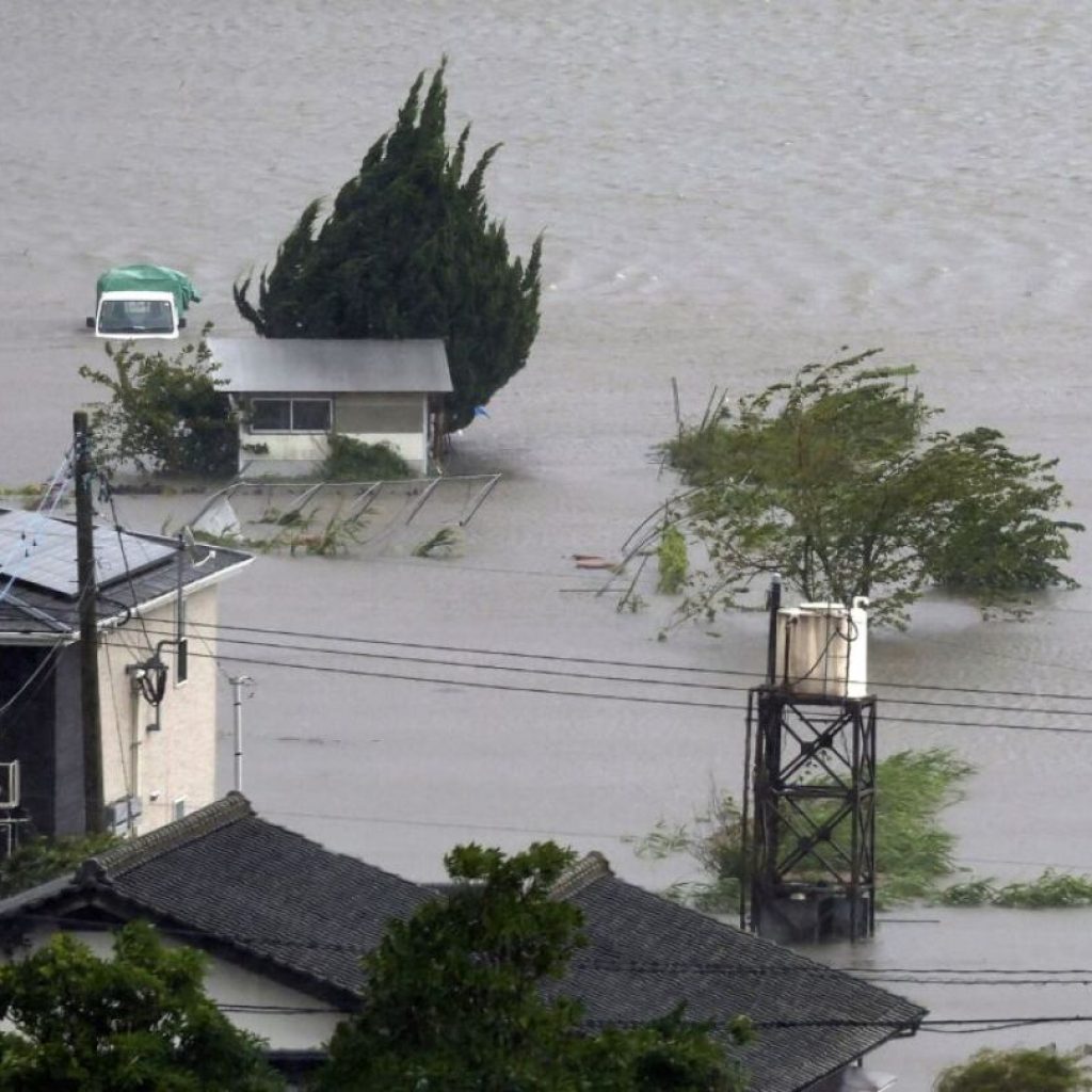 Typhoon Shanshan lashes Japan with torrential rain and strong winds | AP News