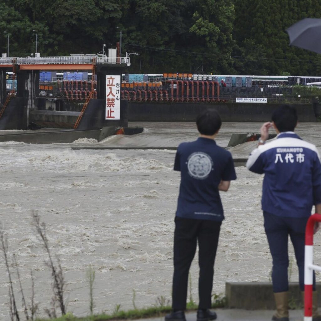 Slow tropical storm dumps heavy rain around Tokyo after causing floods in southern Japan