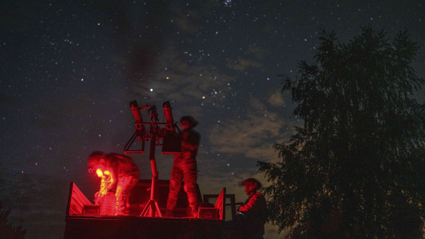 With men at the front lines, women watch over Ukraine’s night sky for Russian drones