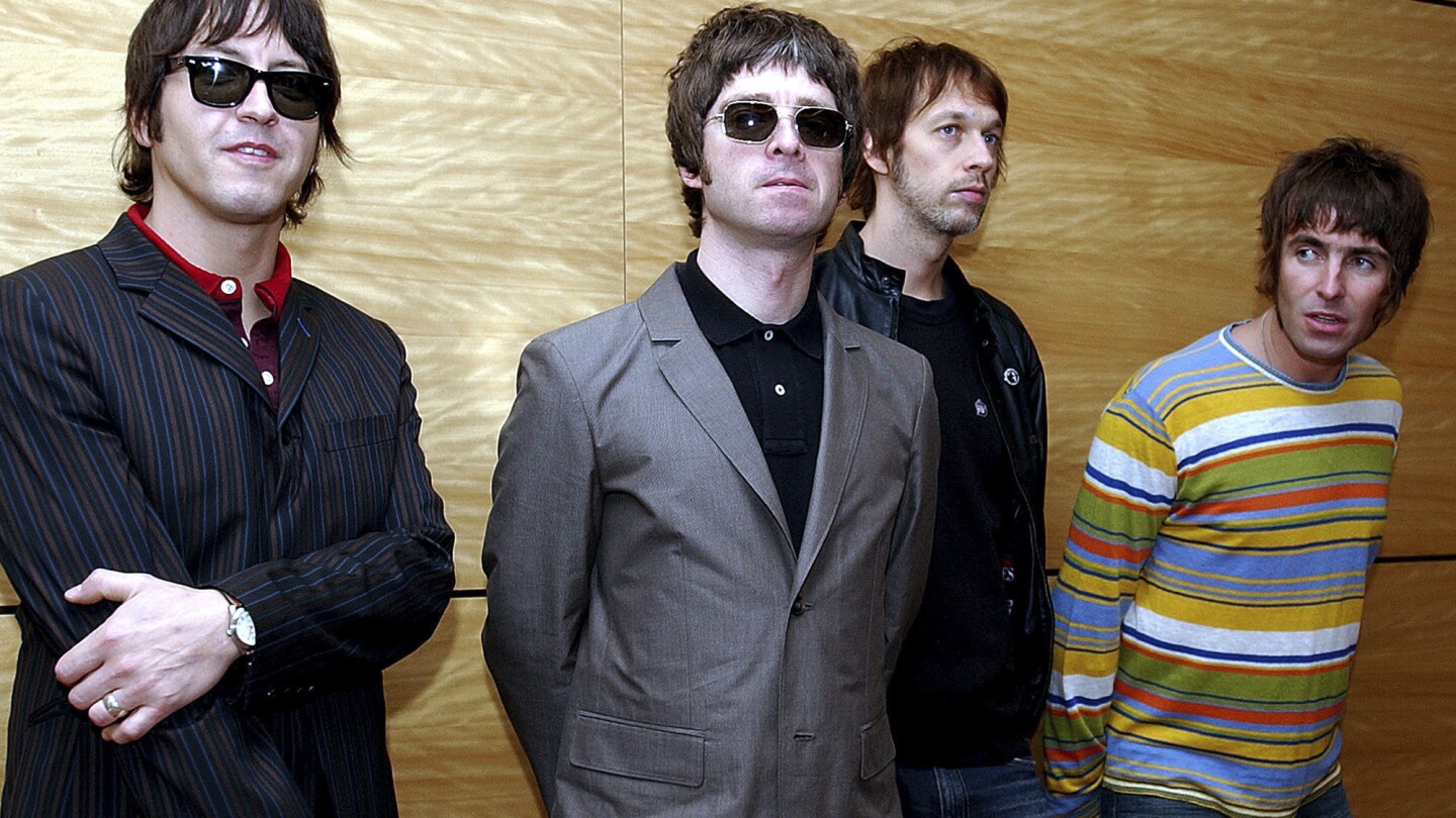 Error messages and lengthy online queues greet fans scrambling to secure Oasis reunion tickets