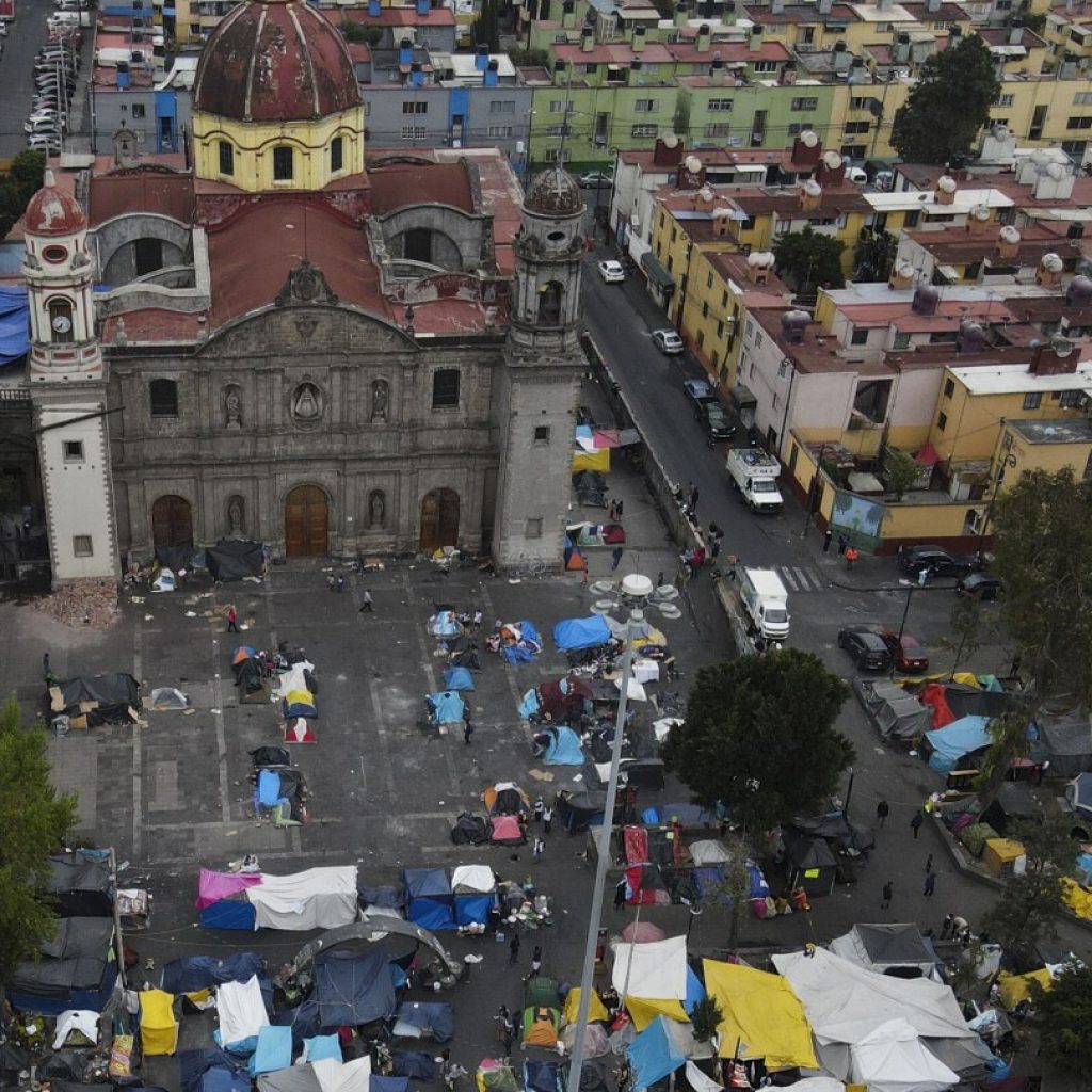 Migrants build makeshift life in Mexico City while waiting for US asylum