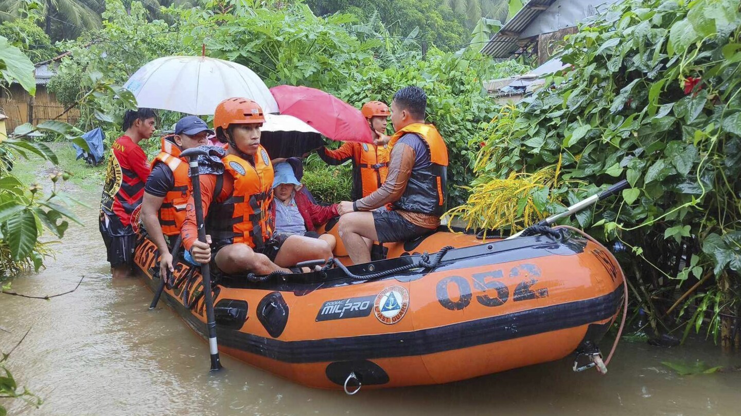 Storm floods northern Philippine regions, including capital, disrupting schools, work and travel