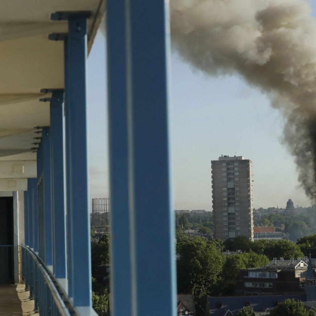 Survivors hope for answers as an inquiry delivers its report on London’s deadly Grenfell Tower fire