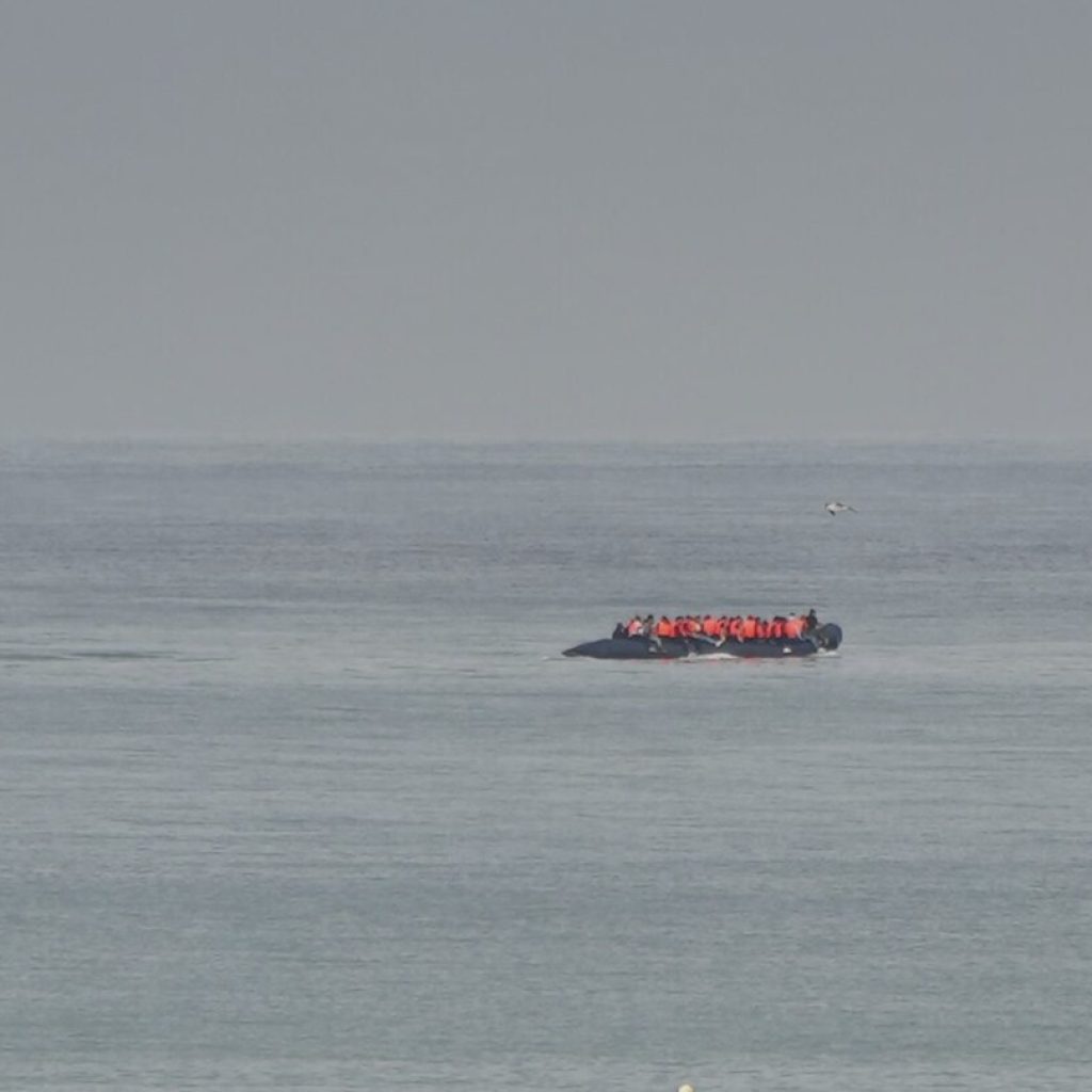 Migrant boat seen trying to make an apparent crossing of English Channel a day after 12 people died