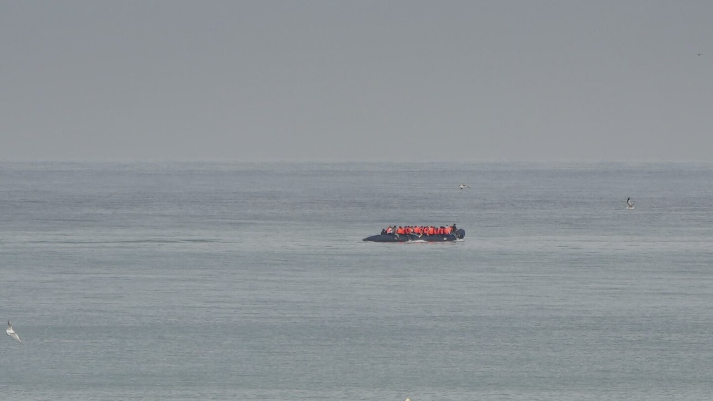 Migrant boat seen trying to make an apparent crossing of English Channel a day after 12 people died