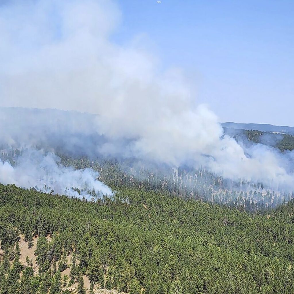 Break in the weather helps contain a wildfire near South Dakota’s second-biggest city