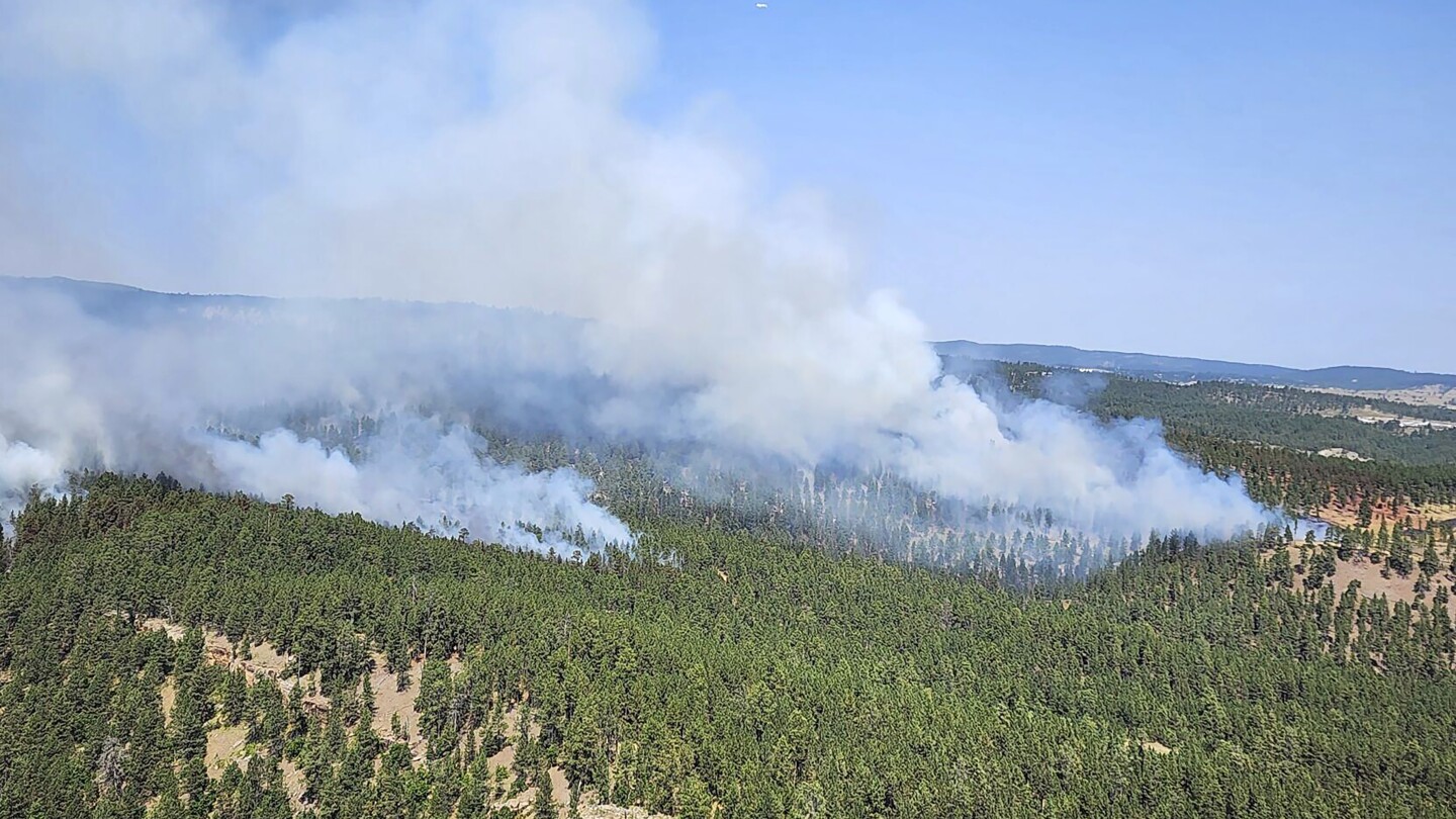 Break in the weather helps contain a wildfire near South Dakota’s second-biggest city