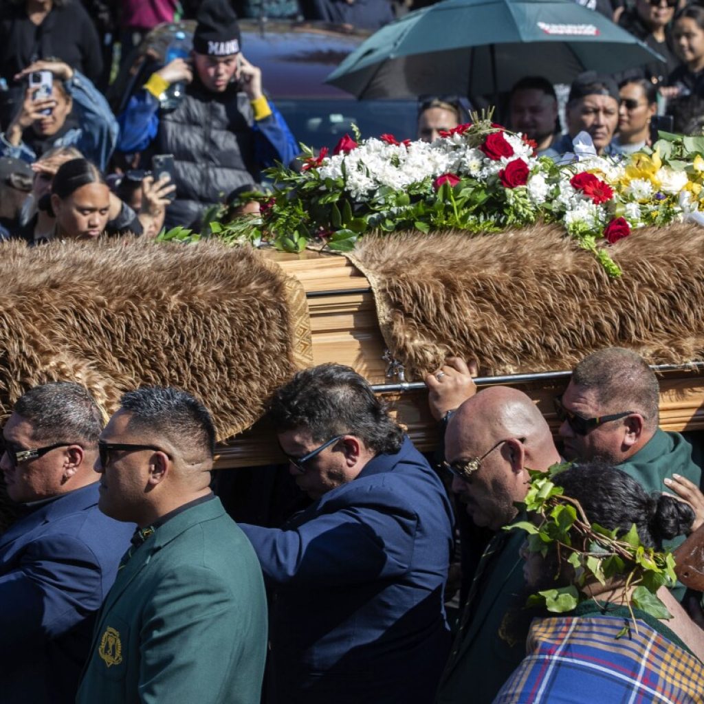 A Māori king who urged racial unity in New Zealand is laid to rest and a new queen rises