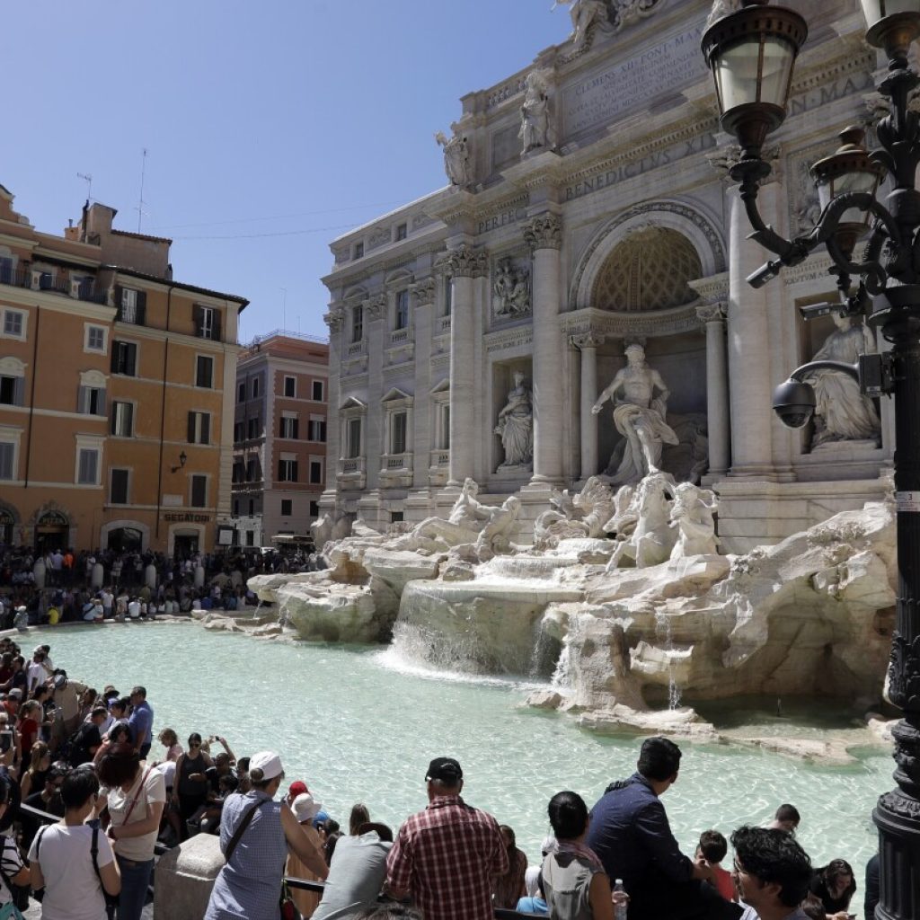 Rome considers imposing a fee to discourage crowds and plunges at Trevi Fountain