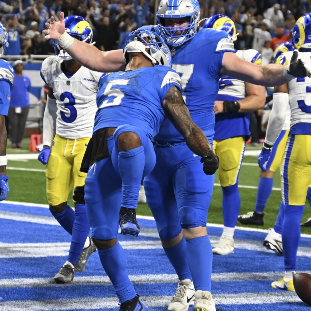 Montgomery’s 1-yard touchdown run in OT lifts Lions to 26-20 win over Rams