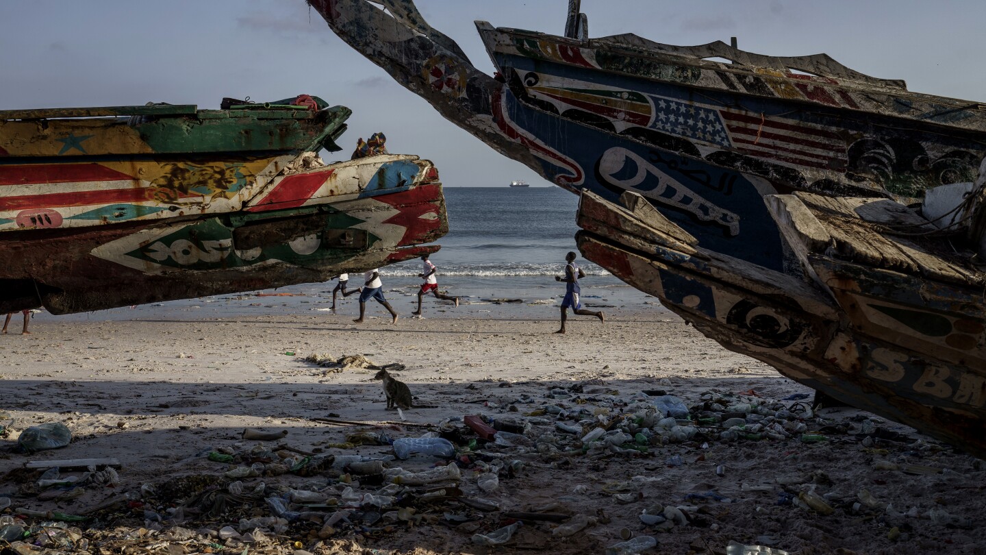 At least 4 migrants have died and others remain missing after a boat capsized off Senegal