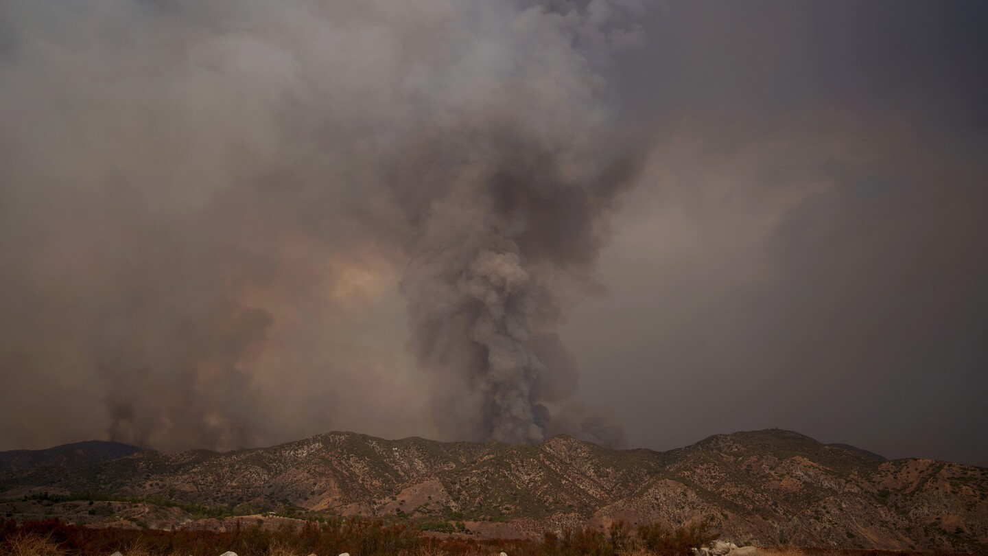 Thousands evacuate as wildfires rage outside Los Angeles and Reno, Nevada