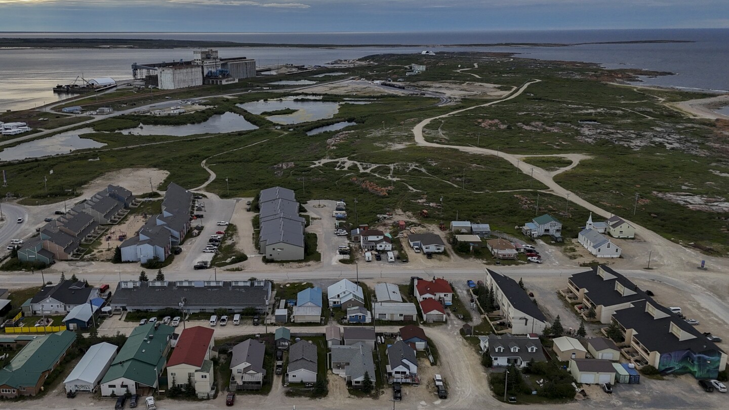 Northern Canadian town adapts and thrives amid climate change | AP News