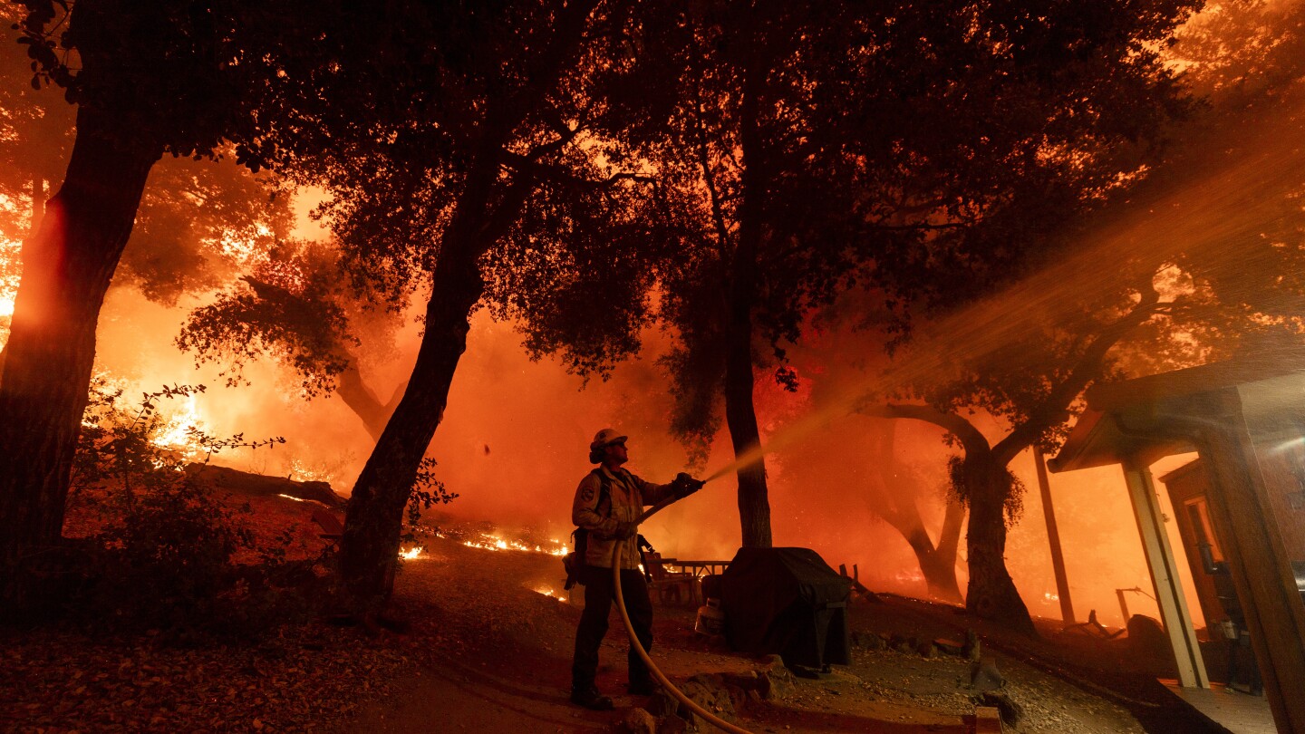 ‘Hellish’ scene unfolds as wildfire races toward California mountain community