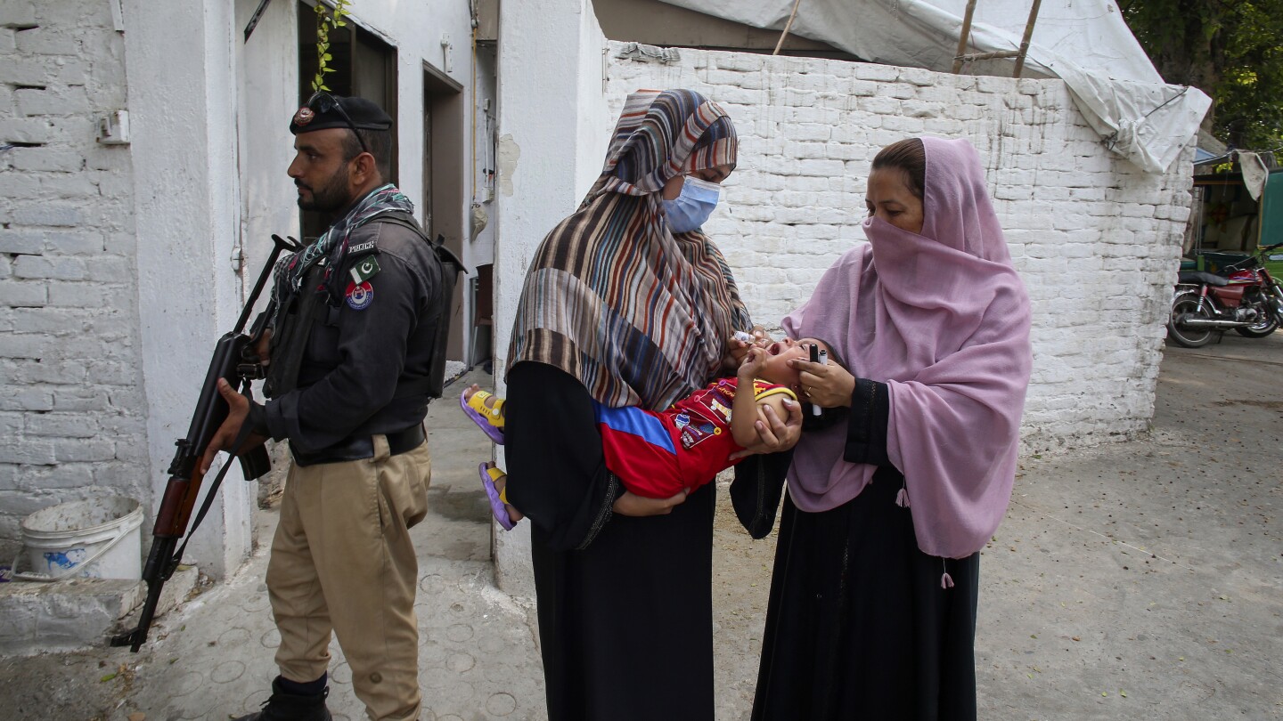 Gunmen kill a polio worker during a vaccination campaign in Pakistan